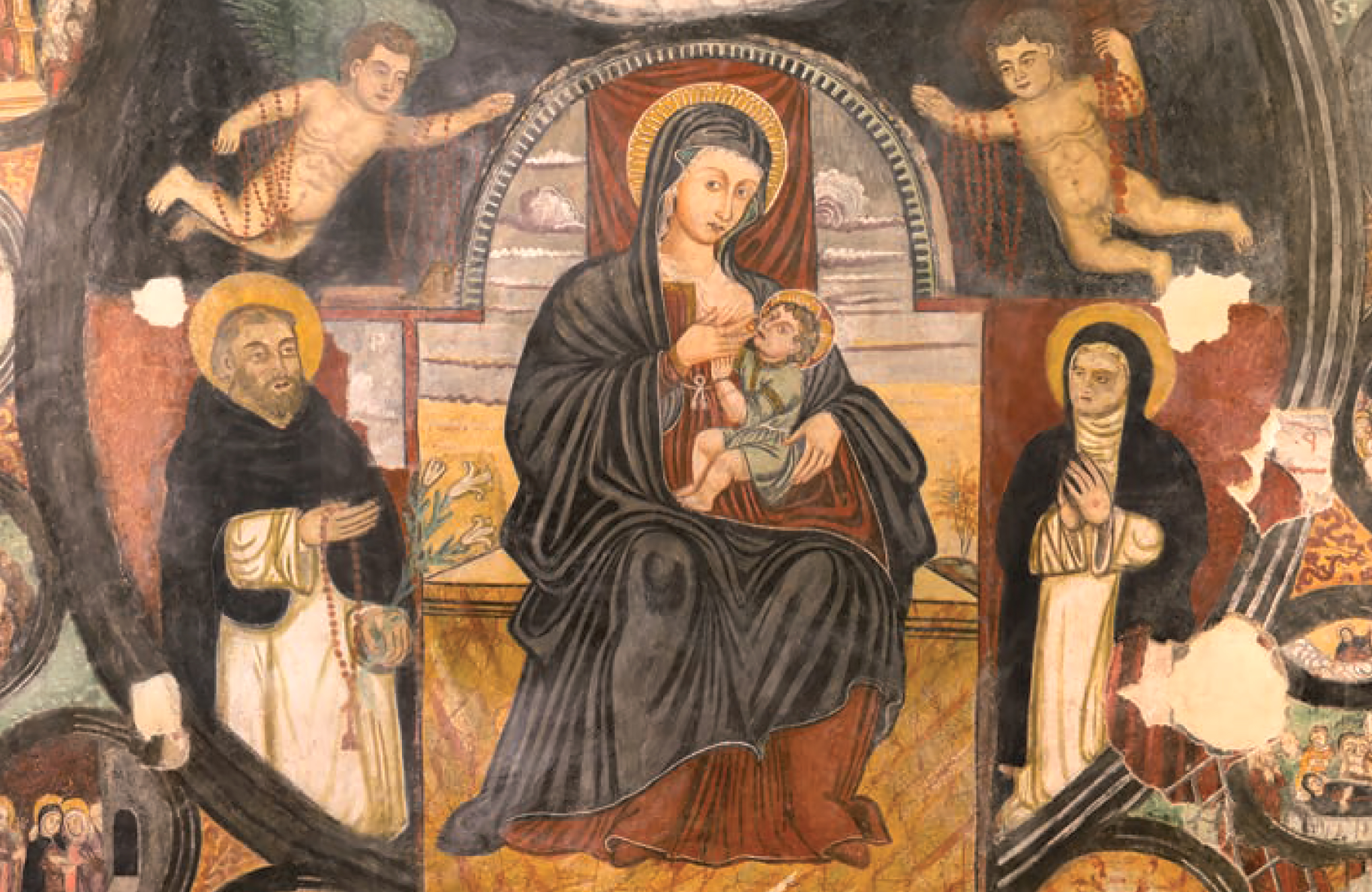 Fig. 4. “Cappelle murate”: Madonna del Latte, rappresentata come una Madonna del Rosario, tra Santa Caterina da Siena e San Domenico di Guzman.